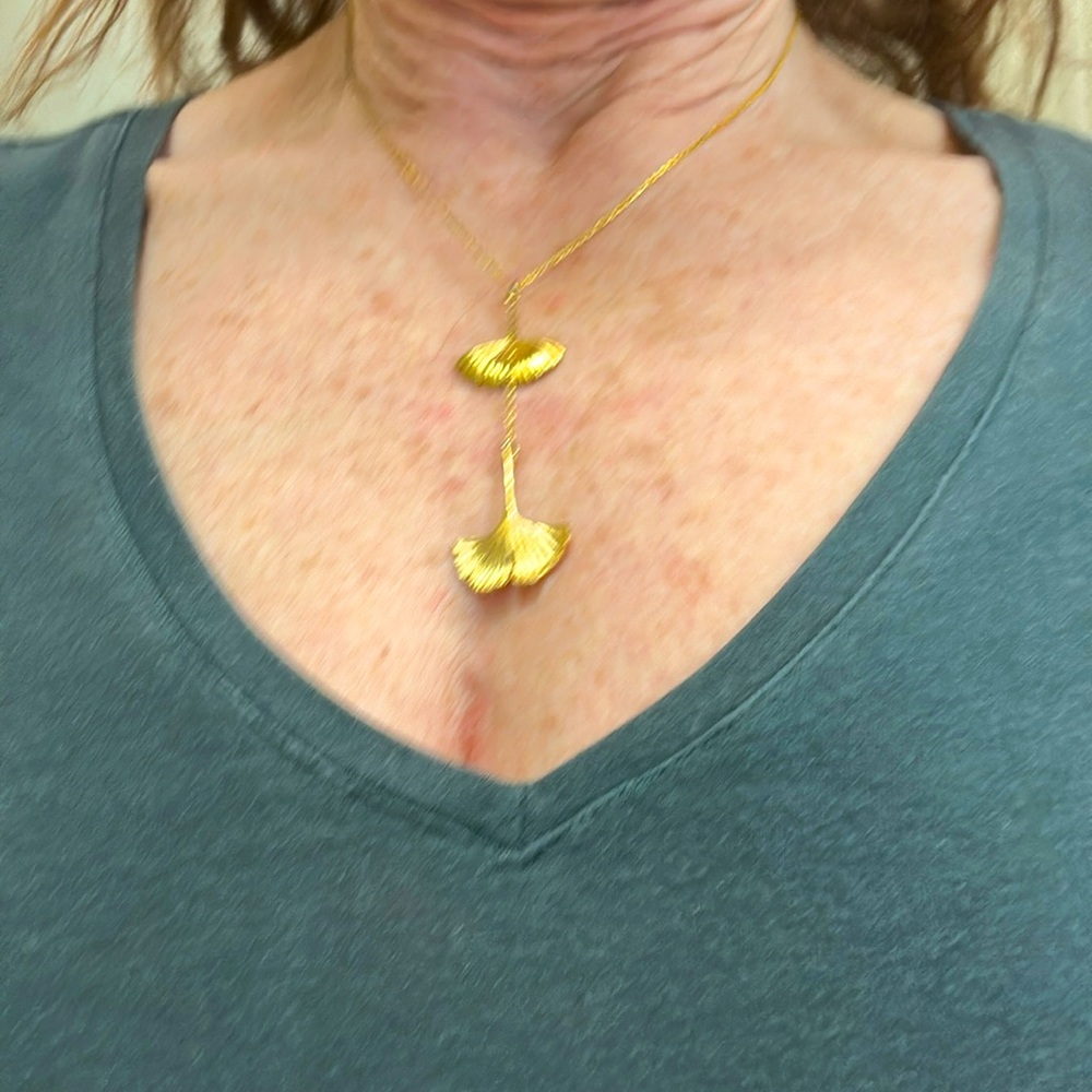 Two tiered yellow, gold multi length necklace
